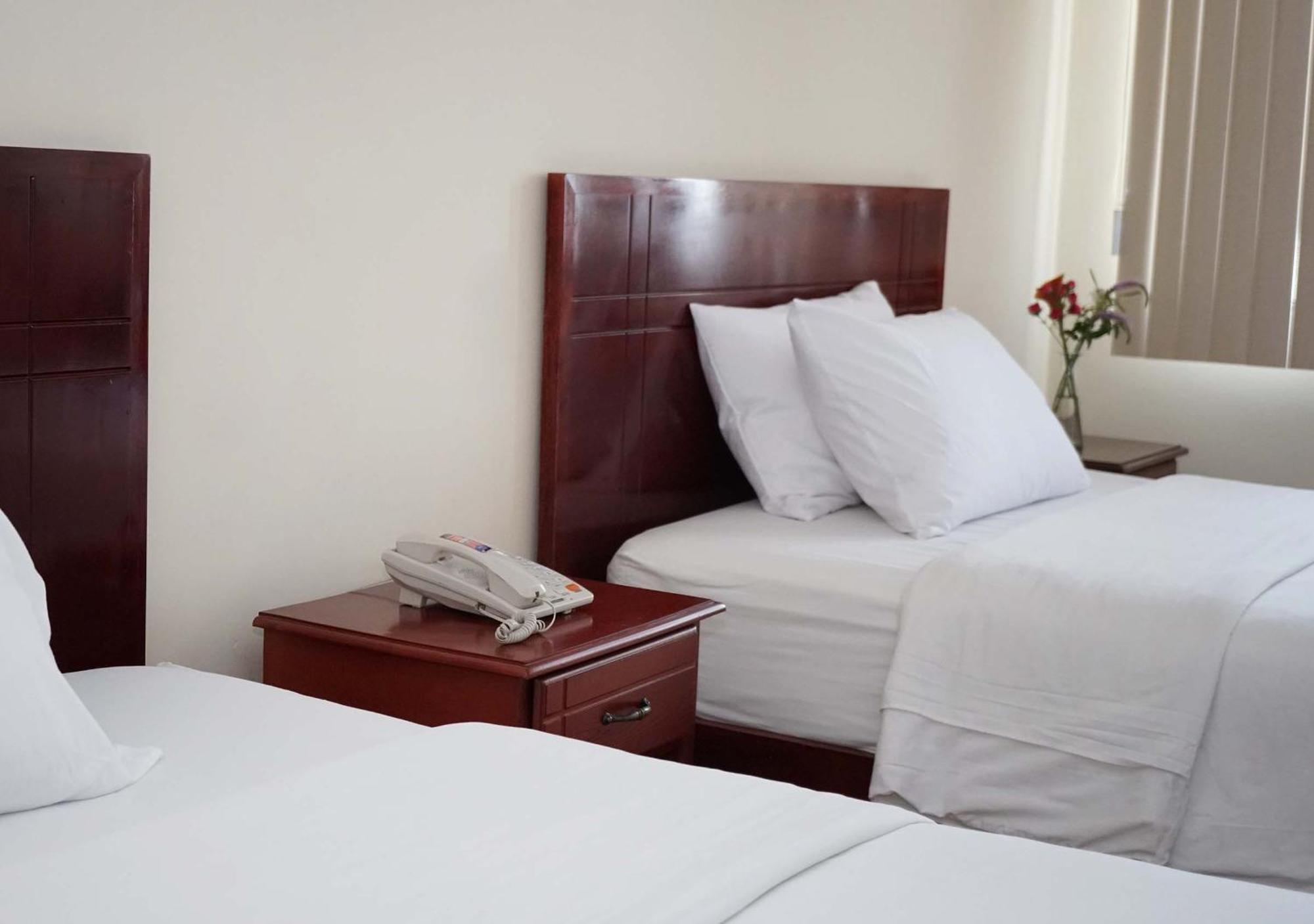 Hotel Lottus Quito Phòng bức ảnh